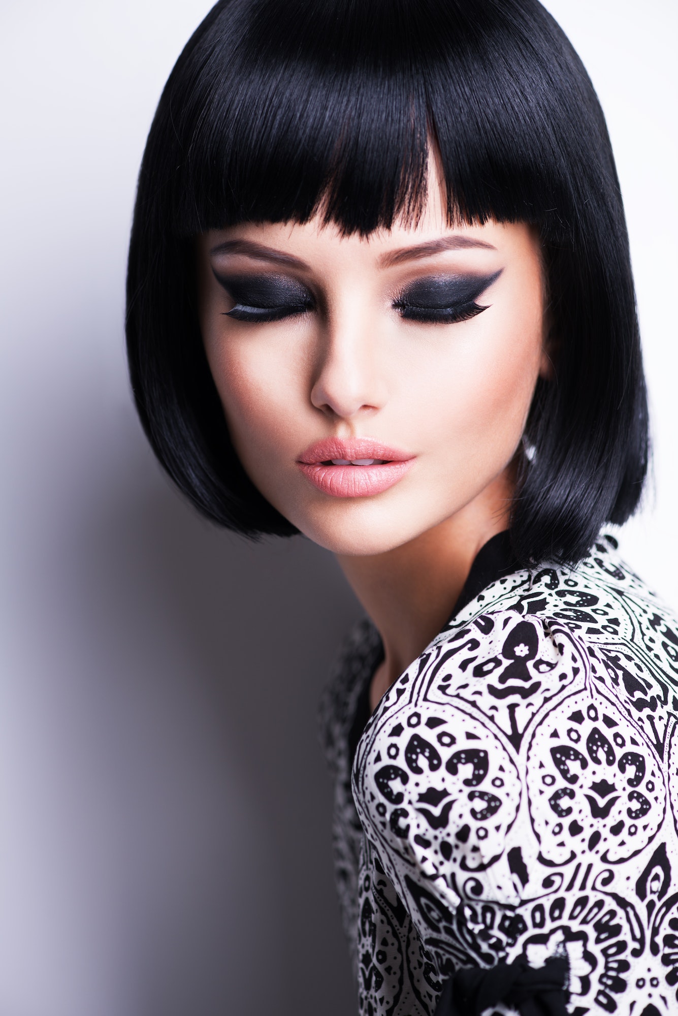 Beautiful brunette woman with short hairstyle.